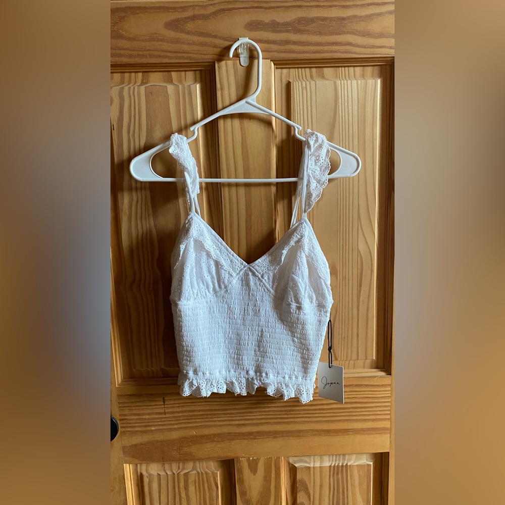 White tank top, size small, made from the brand Japna.
